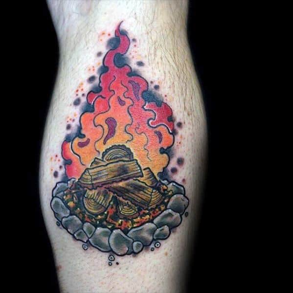 Vibrant campfire tattoo with glowing orange and red flames, detailed logs, and a stone circle outlined in bold black ink.
