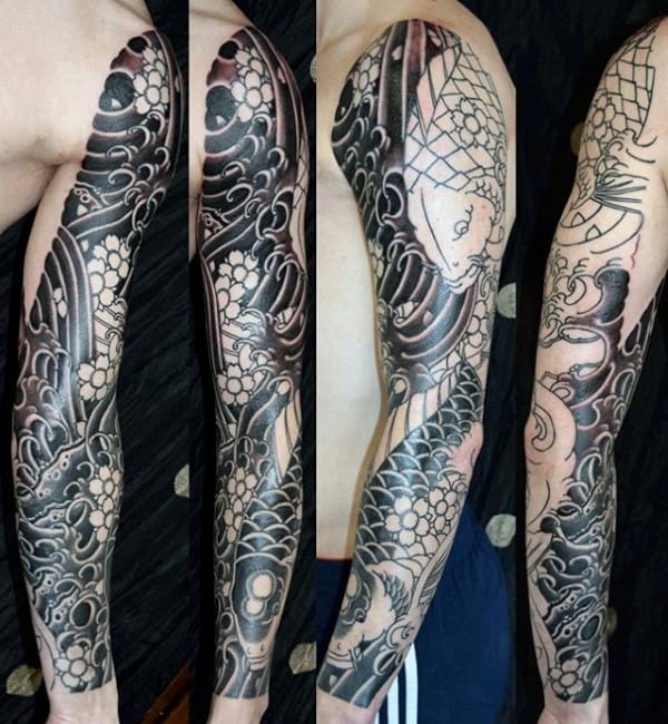 Black and grey Japanese-style full sleeve tattoo featuring koi fish, swirling waves, cherry blossoms, and intricate shading for a bold design