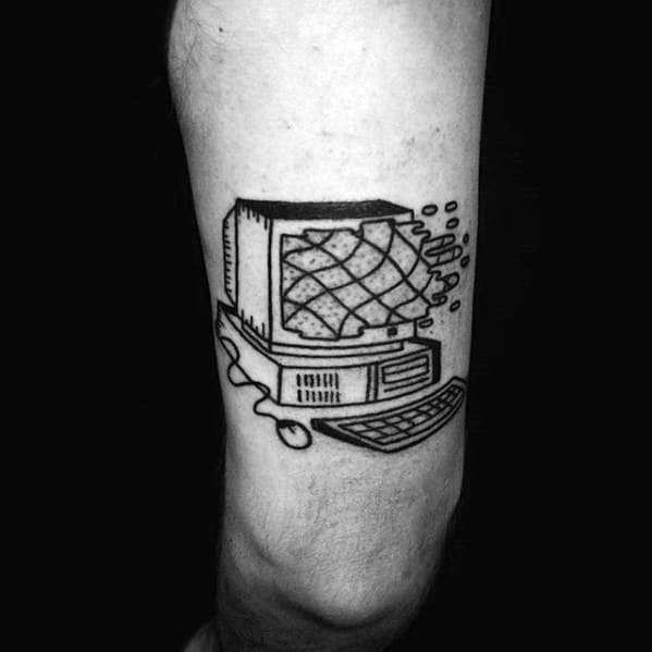 Blackwork tattoo of a vintage computer with a melting pixelated screen, keyboard, and mouse, symbolizing digital decay or transformation.
