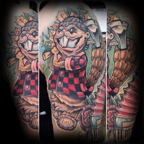 Smiling lumberjack beaver tattoo in a red plaid shirt holding an axe, surrounded by maple leaves and tree stump details in cartoon style.