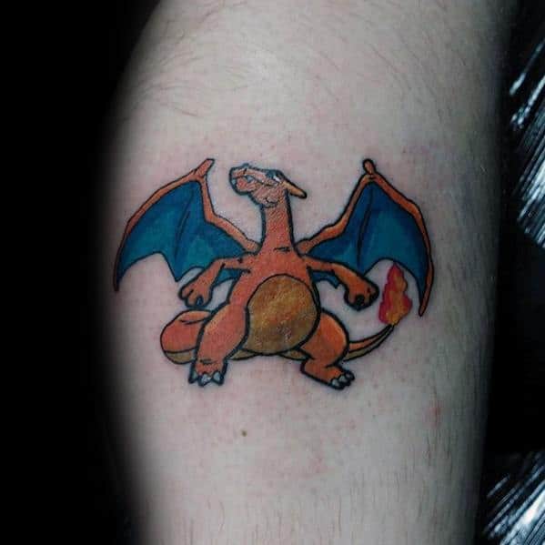 Simple Charizard tattoo with teal wings and flame tail, featuring a compact design and bold cartoon-style outlines.
