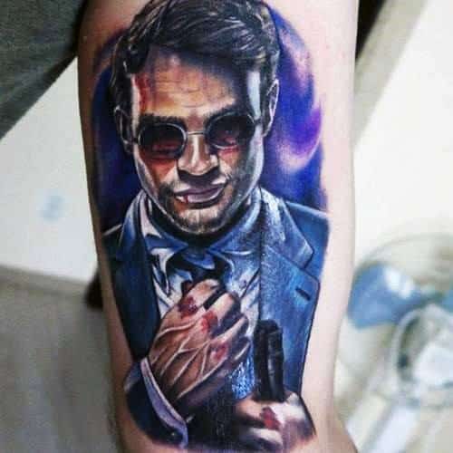 Realistic Matt Murdock tattoo with bloodied knuckles, a smirk, red-tinted glasses, and a purple-hued background for dramatic effect.