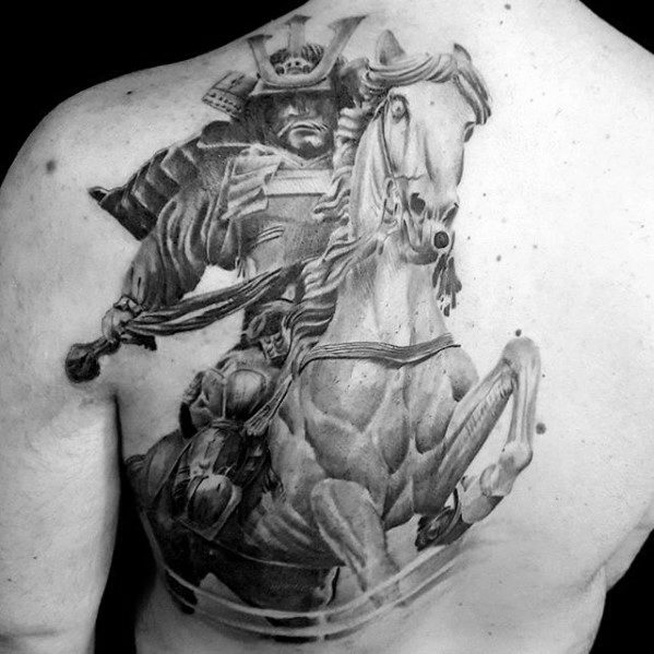 Realistic black and grey tattoo of a samurai warrior riding a rearing horse, placed on the upper back with dramatic shading and detail