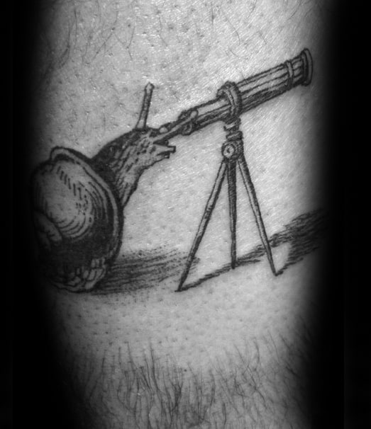 Black and white tattoo concept of a snail peering through a telescope