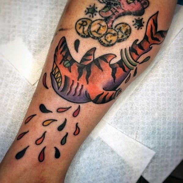 Bold tiger shark tattoo with vibrant orange and purple tones, surrounded by colorful teardrops for a dramatic, neo-traditional effect.