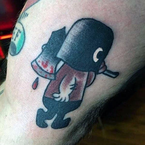 Cartoon-style executioner tattoo featuring a small hooded figure carrying a bloodied axe, with bold outlines and simple shading.