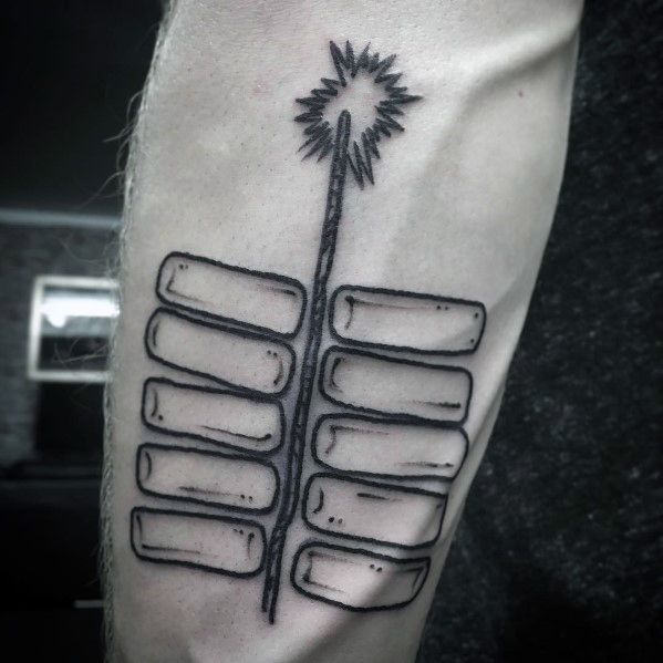 Minimalist black ink tattoo of a string of firecrackers with a lit fuse, featuring bold outlines and a simple yet striking design.