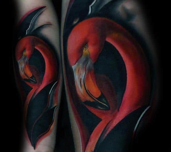 Hyper-realistic flamingo tattoo with deep red hues, dramatic black shading, and a sleek, high-contrast design for a bold and striking look.