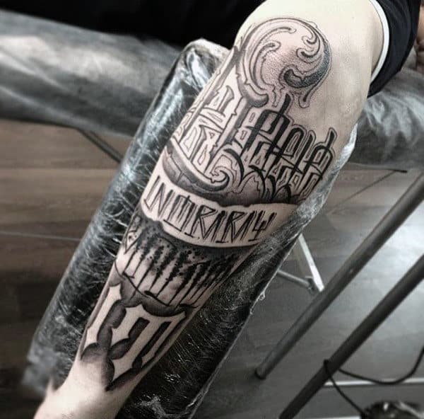 Male Forearms Celtic Lettering Tattoo