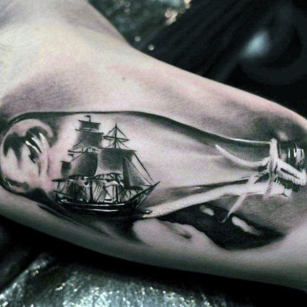 Male Forearms Cute Ship In Glass Bottle Realistic Tattoo