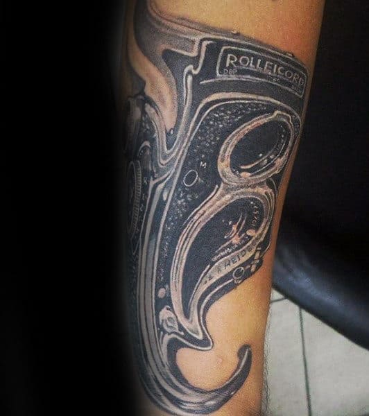 Male Forearms Melting Camera Tattoo