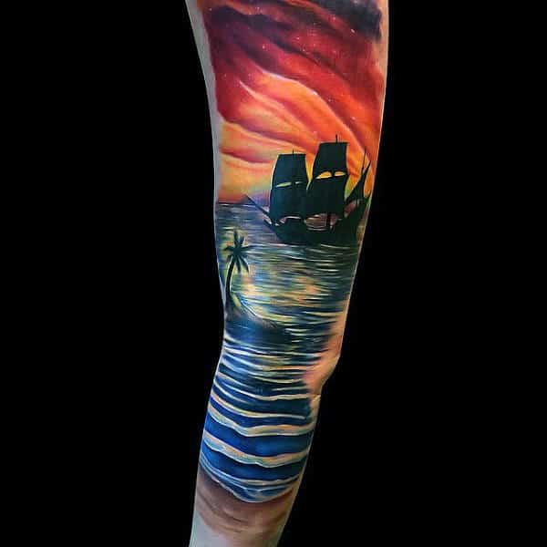 Male Full Sleeve Ship Sailing At Sunset Tattoo