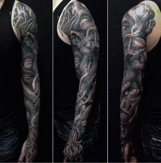 Male Full Sleeves Heavy Detailing Black Eyes Tattoo