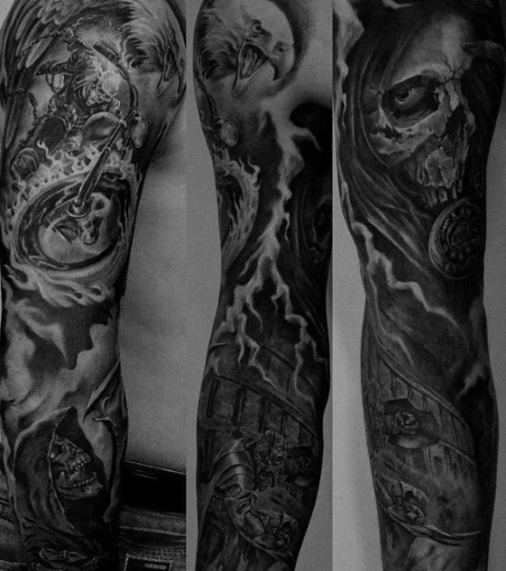 Black and grey Ghost Rider sleeve tattoo with dramatic skulls, a roaring eagle, fiery motorcycle, and stormy lightning effects throughout.