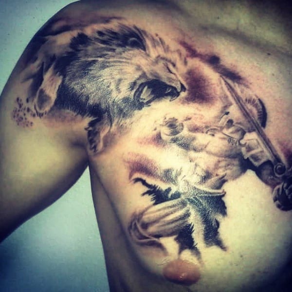 Tattoo on a person's chest featuring a fierce wolf and a gladiator warrior wielding a sword