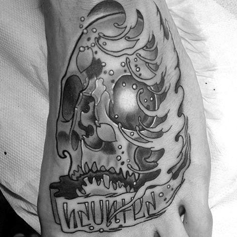 Black and white tattoo of a skull with waves