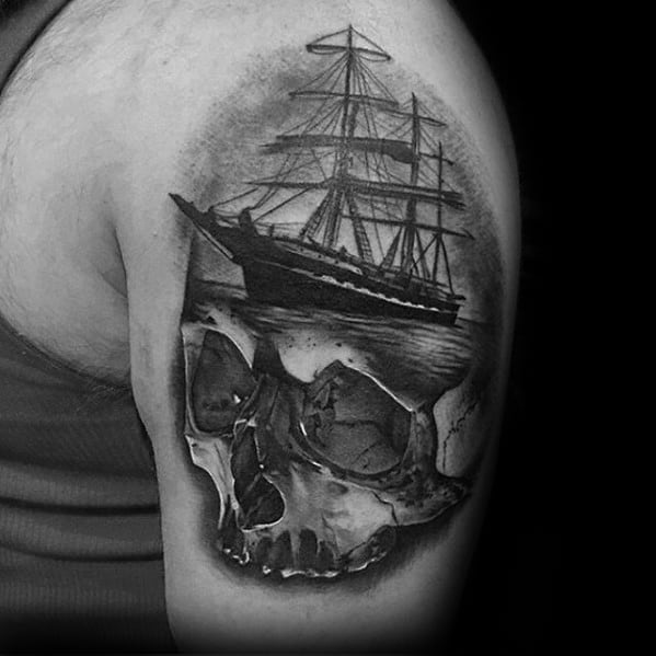 Male Greatest Skull And Ship Tattoo Ideas On Upper Arm