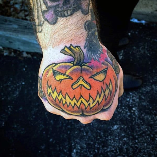 Male Hands Orange Halloween Pumpkin Tattoo