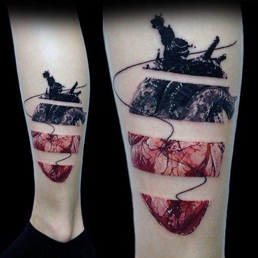 Male Heart Lower Leg Tattoo With Red And Black Design
