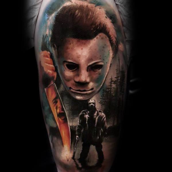 Realistic color tattoo of Michael Myers from *Halloween*, featuring his eerie mask, a bloodied knife, and a dark, haunting forest scene for a chilling effect.