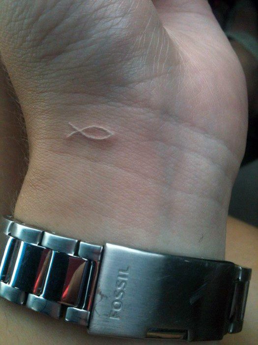 Male Ichthus Tattoo Design Inspiration White Ink Wrist Small