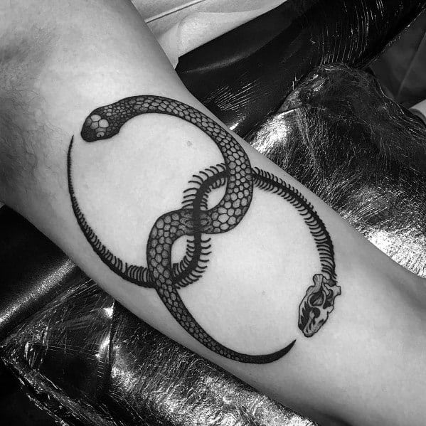 Male Inner Arm Bicep Snake Skeleton Themed Tattoo Inspiration