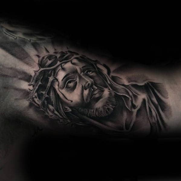 Male Inner Arm Portrait Tattoo Of Jesus