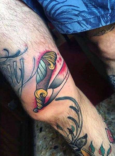 Male Knees Bloody Neo Traditional Weapon Tattoo