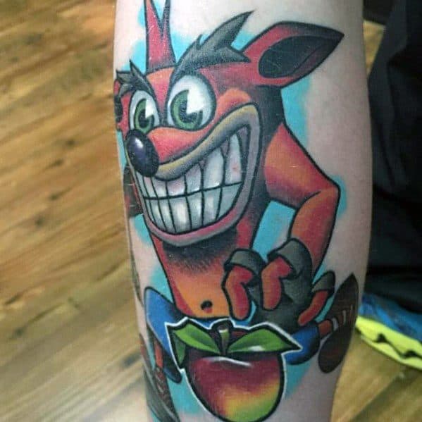 Male Leg Video Game Tattoo With Crash Bandicoot Design