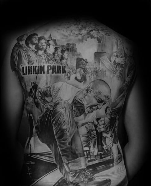 Full-back black and gray Linkin Park tattoo featuring Chester Bennington performing, band members, and a dramatic collage of scenes.