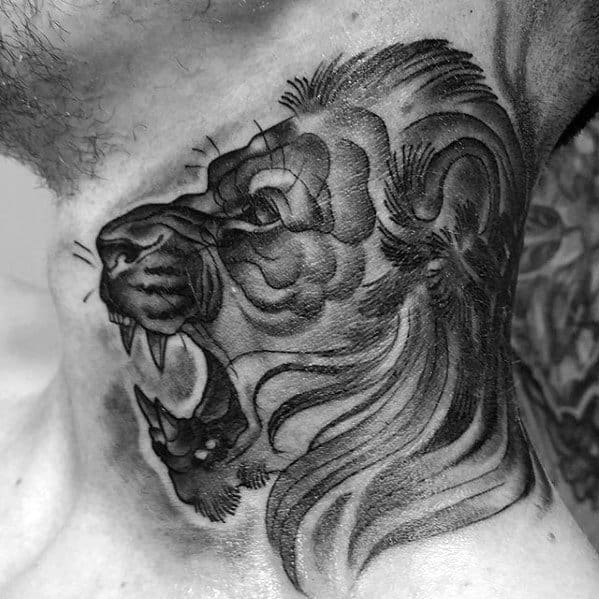 Bold roaring lion neck tattoo with intricate shading and flowing mane, creating a fierce and dynamic design symbolizing strength and power.