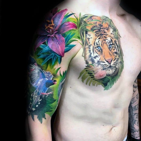 Vibrant jungle-themed tattoo sleeve featuring a realistic tiger, a magpie in flight, lush green foliage, and bold pink lilies for a dynamic look.