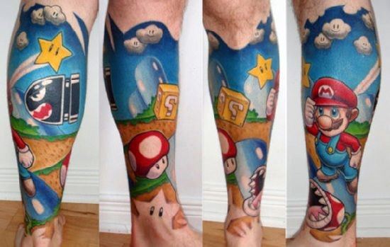 Full-leg *Super Mario* tattoo featuring a vibrant level design with Mario, Bullet Bill, power-ups, and classic game elements in bold colors.