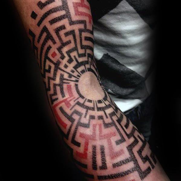 Male Maze Red And Black Ink Inner Arm Tattoo Design Inspiration
