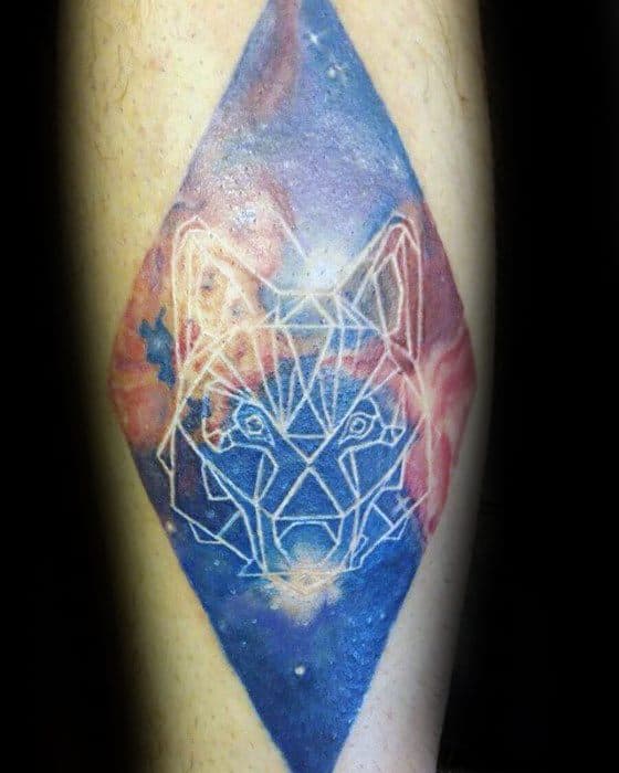 Geometric wolf tattoo with a cosmic nebula background and floral accents