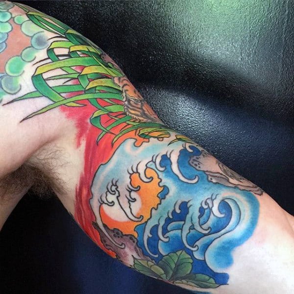 Male Neo Traditional Bicep Tattoo Ocean Waves At Sunset