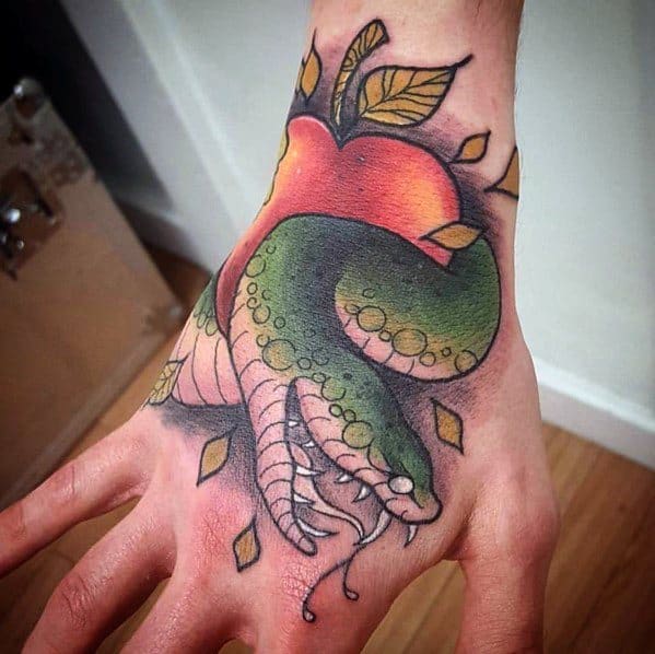 Neo-traditional tattoo of a green snake coiled around a vibrant red apple, with bold shading and crisp linework on the hand for a striking effect.