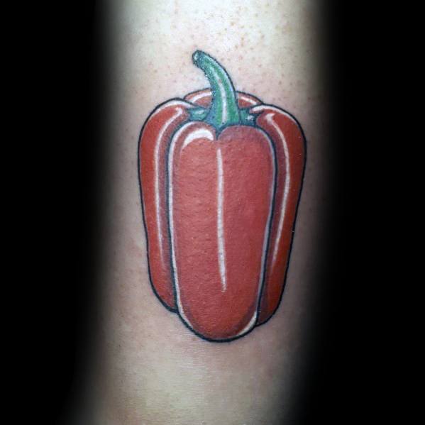 Realistic red bell pepper tattoo with bold shading and a green stem, featuring clean outlines for a vibrant and fresh design.