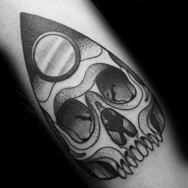Male Planchette Skull Themed Arm Tattoo Design Inspiration