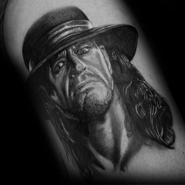 Male Portrait Tattoo With Wrestling Design On Arm