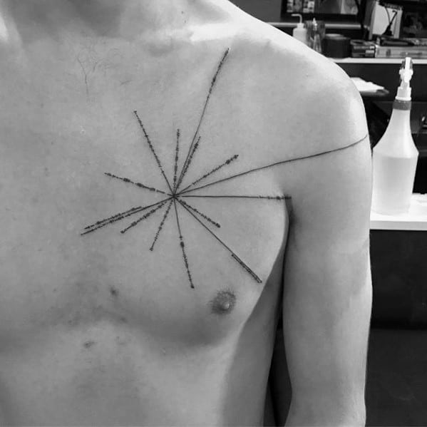 Minimalist starburst tattoo with a pulsar map design on a person's chest in a tattoo studio setting