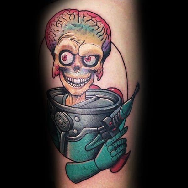 Colorful alien tattoo featuring a menacing skeletal figure with an exposed brain, holding a retro ray gun, inspired by classic sci-fi themes.