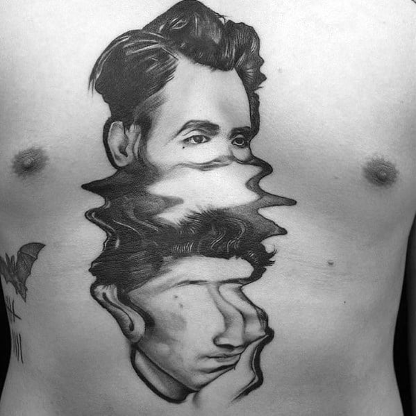 Tattoo of a man's face distorted like a water reflection, creating a surreal and mind-bending visual effect with intricate shading.