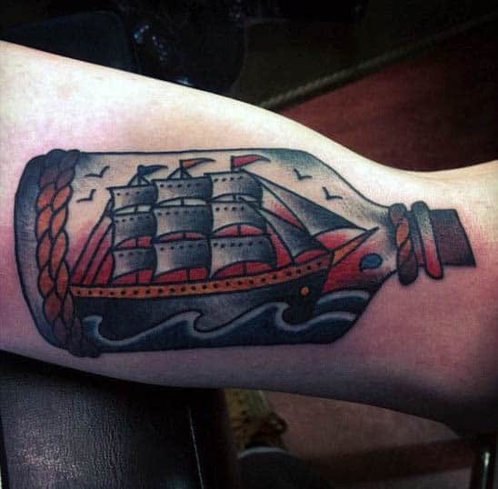 Male Sailing Vessel Tattoos In A Bottle On Bicep