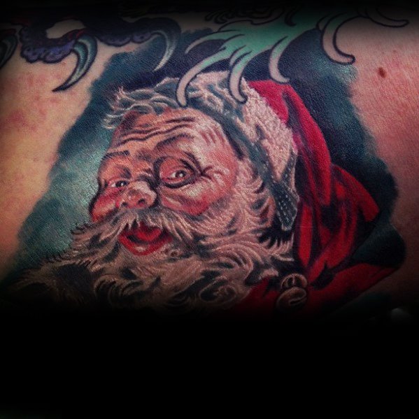 Unique Santa Claus tattoo with a bold, expressive face, rich shading, and a slightly mischievous look, blending realism with a surreal festive twist.