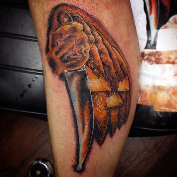 Male Scary Pumpkin Tattoos With Knife On Leg Calf