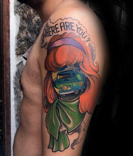 Tattoo of Daphne’s silhouette with the Mystery Machine in place of her face, and “Where Are You?” written in smoke above her head.