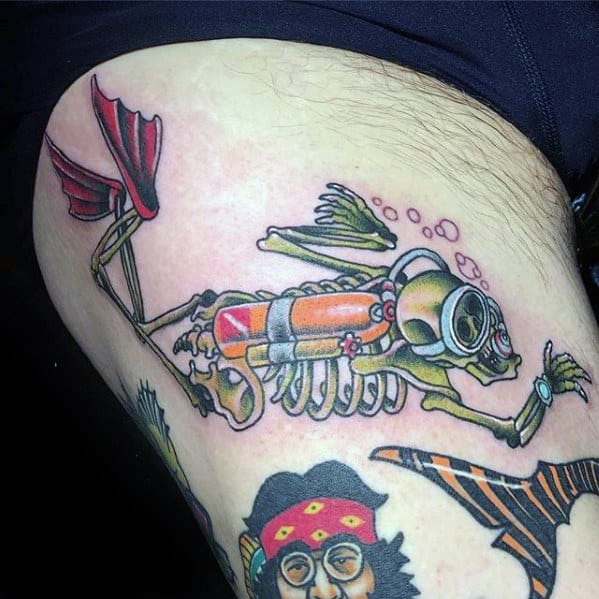 Colorful cartoon-style tattoo of a scuba diving skeleton with red fins and an oxygen tank, swimming underwater.