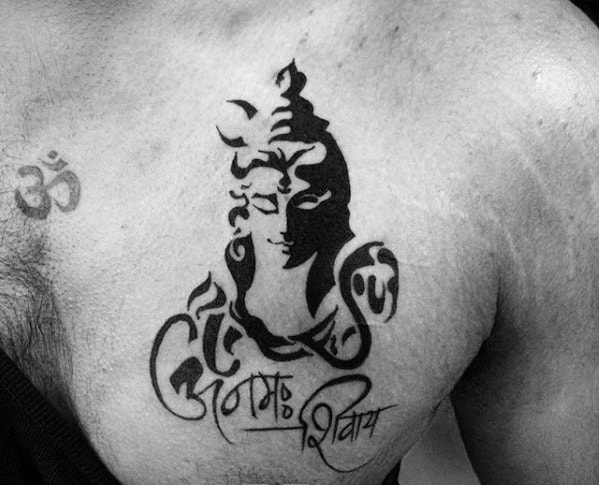 Minimalist Lord Shiva tattoo on the chest with bold black ink, featuring Om symbols and stylized Hindi calligraphy beneath the figure.