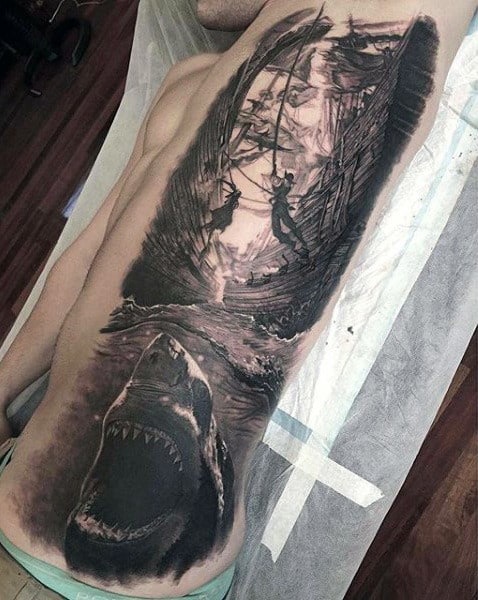 Male Side Ribs Escaping From Hungry Shark Tattoo